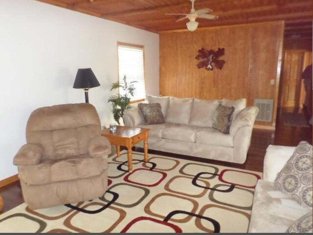 130 Morgan View Rd, Wellington, KY 40387 - living area with wooden ceiling, ceiling fan, wood finished floors, and wood walls