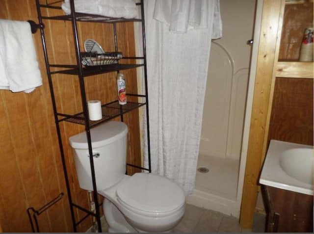 130 Morgan View Rd, Wellington, KY 40387 - bathroom featuring a stall shower, vanity, toilet, and tile patterned flooring