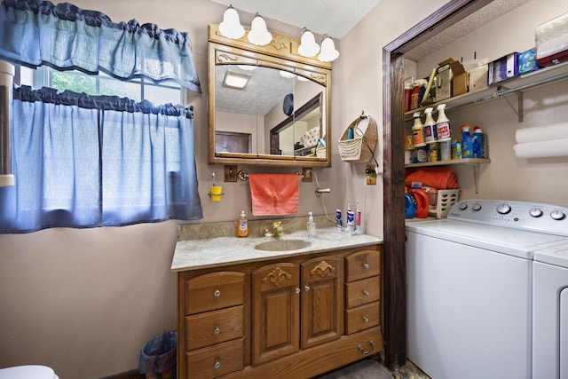 600 Tug Branch Rd, Clay City, KY 40312 - bathroom featuring washing machine and dryer, vanity, and toilet