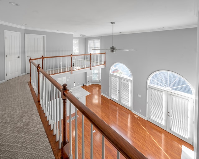 244 Chippendale Cir, Lexington, KY 40517 - hallway with ornamental molding, baseboards, an upstairs landing, and wood finished floors