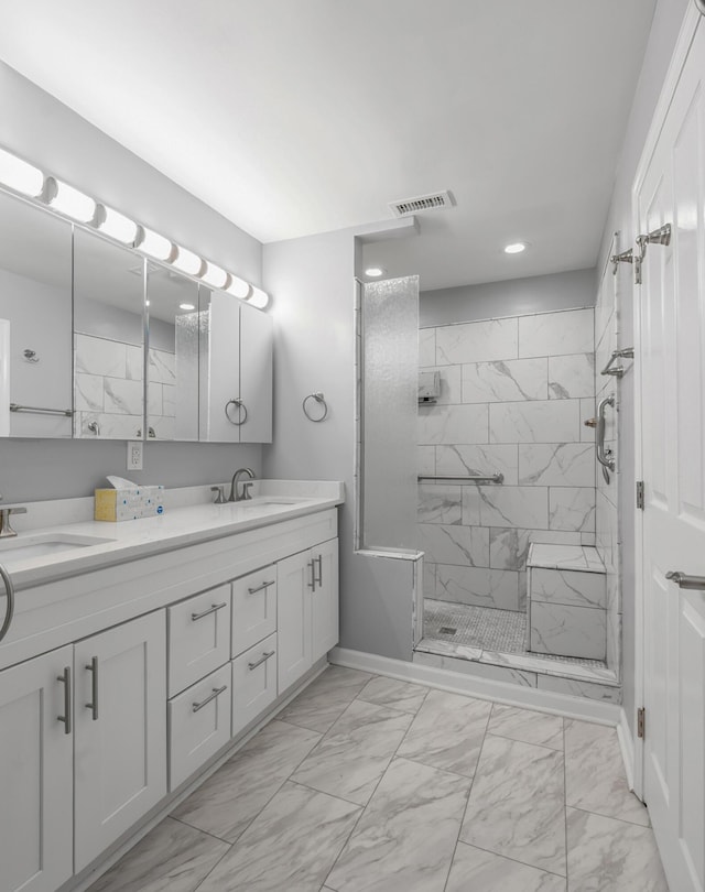 244 Chippendale Cir, Lexington, KY 40517 - bathroom featuring marble look tiles, double vanity, a marble finish shower, recessed lighting, and baseboards