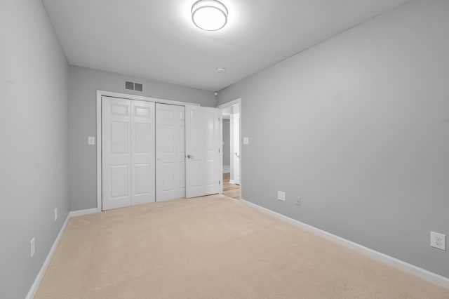 244 Chippendale Cir, Lexington, KY 40517 - unfurnished bedroom featuring carpet flooring, baseboards, and a closet