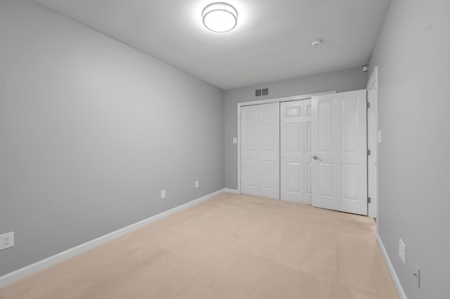 244 Chippendale Cir, Lexington, KY 40517 - unfurnished bedroom with light colored carpet, baseboards, and a closet