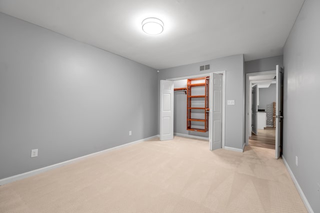 244 Chippendale Cir, Lexington, KY 40517 - unfurnished bedroom featuring light carpet, baseboards, and a closet