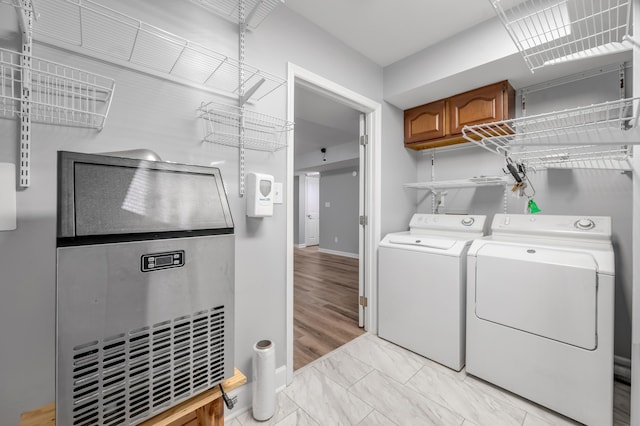 244 Chippendale Cir, Lexington, KY 40517 - washroom featuring washer and dryer, light marble finish floors, and baseboards