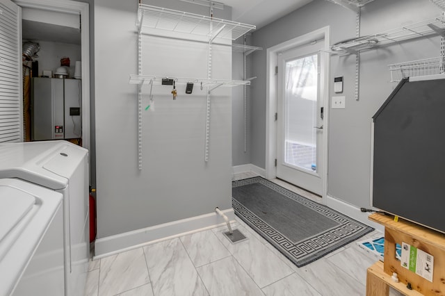 244 Chippendale Cir, Lexington, KY 40517 - laundry area with washer and dryer, baseboards, and water heater