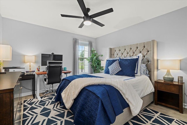 588 E Fifth St, Lexington, KY 40508 - bedroom featuring an office area, light wood-style floors, and ceiling fan