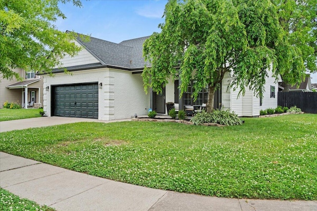 588 E Fifth St, Lexington, KY 40508 - view of front of property with a garage, concrete driveway, and a shingled roof