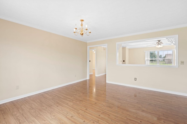 174 Shirdell Dr, Richmond, KY 40475 - spare room featuring a chandelier, ornamental molding, baseboards, and light wood-style flooring