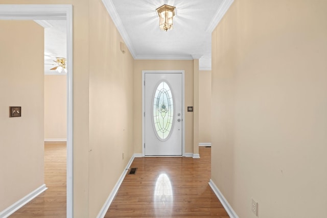 174 Shirdell Dr, Richmond, KY 40475 - entryway with wood finished floors, ornamental molding, and baseboards