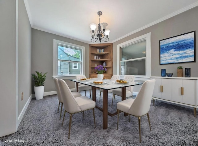 213 W Elm St, Nicholasville, KY 40356 - carpeted dining room with a chandelier, built in shelves, ornamental molding, and baseboards