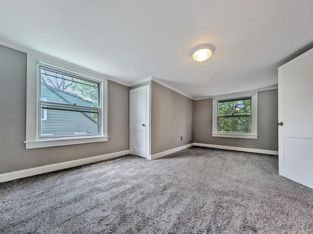 213 W Elm St, Nicholasville, KY 40356 - unfurnished bedroom featuring crown molding, carpet, and baseboards