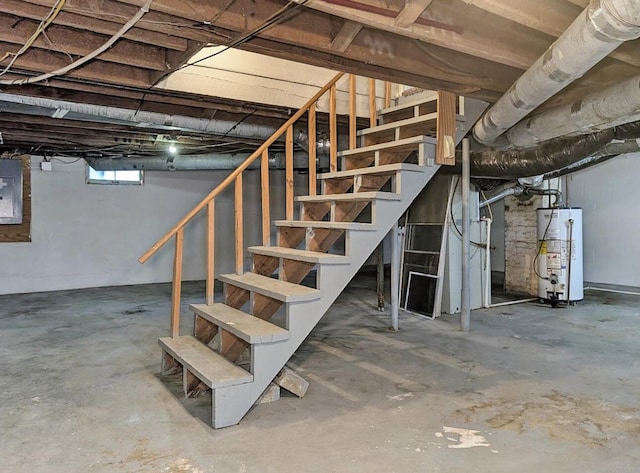 213 W Elm St, Nicholasville, KY 40356 - basement with gas water heater, stairway, and electric panel