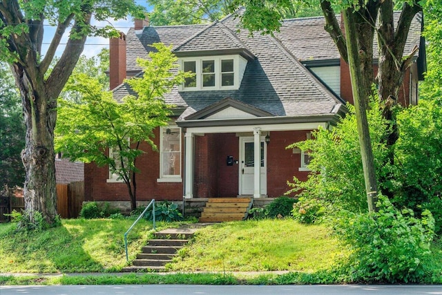 618 N Broadway, Lexington, KY 40508 - view of front of house with a chimney and brick siding