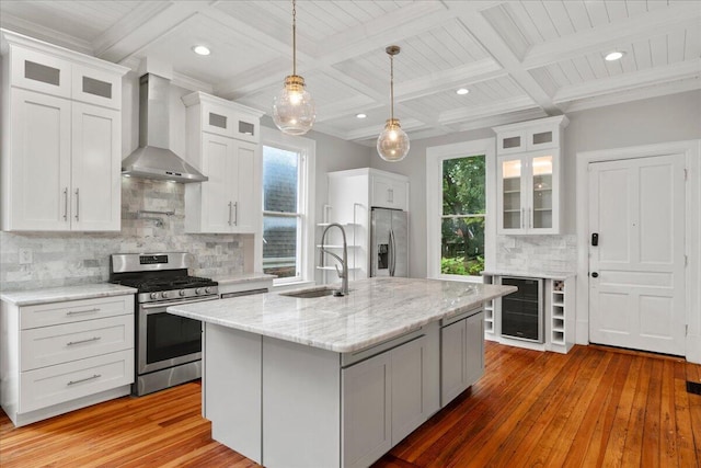 618 N Broadway, Lexington, KY 40508 - kitchen featuring stainless steel appliances, wall chimney exhaust hood, a sink, wine cooler, and coffered ceiling