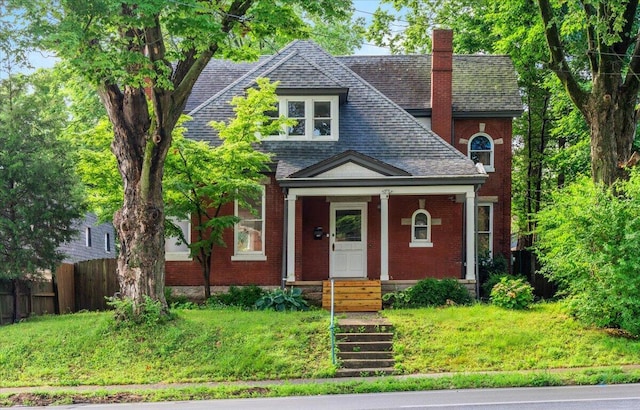 618 N Broadway, Lexington, KY 40508 - view of front of property featuring a chimney, roof with shingles, and brick siding