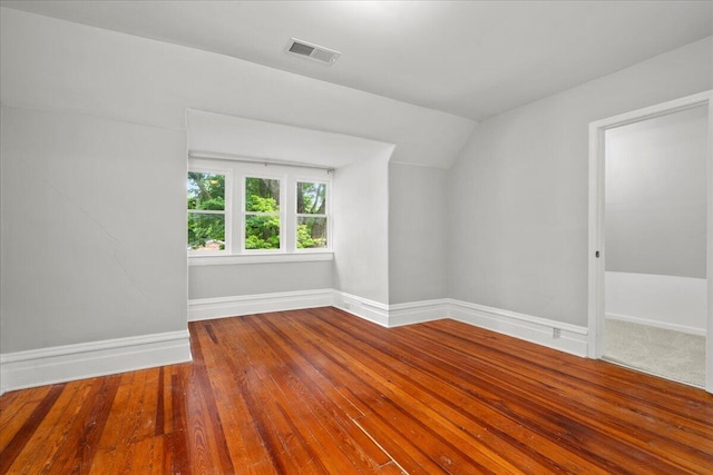 618 N Broadway, Lexington, KY 40508 - additional living space with lofted ceiling, baseboards, and hardwood / wood-style floors