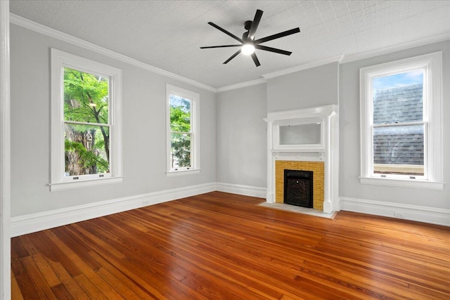 618 N Broadway, Lexington, KY 40508 - unfurnished living room with hardwood / wood-style floors, baseboards, a brick fireplace, a ceiling fan, and crown molding