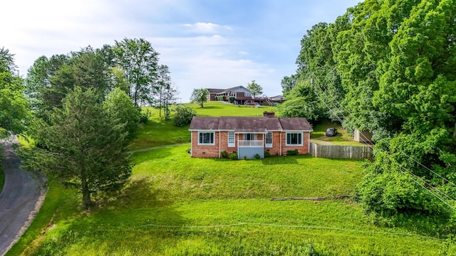 100 Mockingbird Hill Ln, Corbin, KY 40701 - rear view of house with brick siding and a chimney