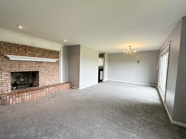 100 Mockingbird Hill Ln, Corbin, KY 40701 - unfurnished living room featuring a brick fireplace, a chandelier, carpet flooring, and baseboards