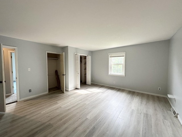 100 Mockingbird Hill Ln, Corbin, KY 40701 - unfurnished bedroom with wood finished floors and baseboards