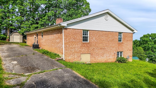 100 Mockingbird Hill Ln, Corbin, KY 40701 - view of property exterior with a chimney and brick siding
