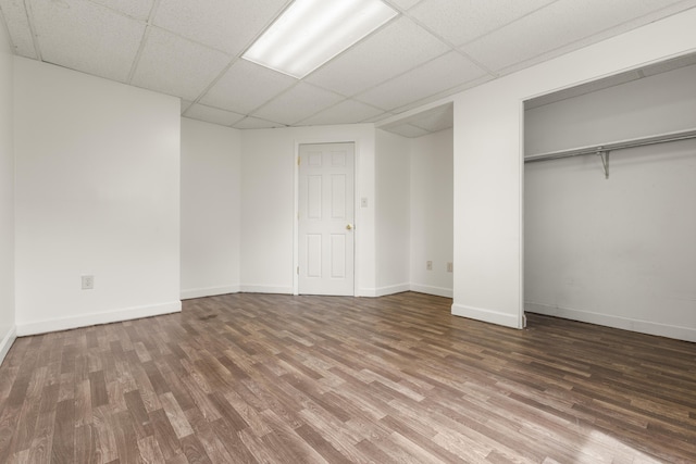 816 Stratton Ln, Winchester, KY 40391 - unfurnished bedroom featuring wood finished floors, a drop ceiling, and baseboards