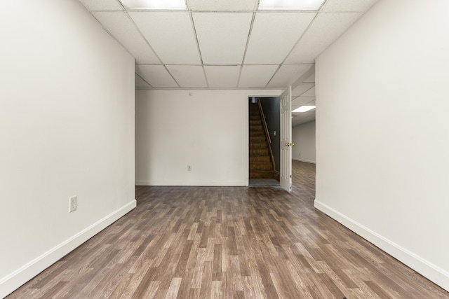 816 Stratton Ln, Winchester, KY 40391 - spare room with a paneled ceiling, stairs, wood finished floors, and baseboards