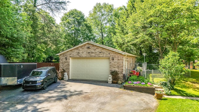153 Pine Trail Rd, London, KY 40744 - detached garage featuring driveway