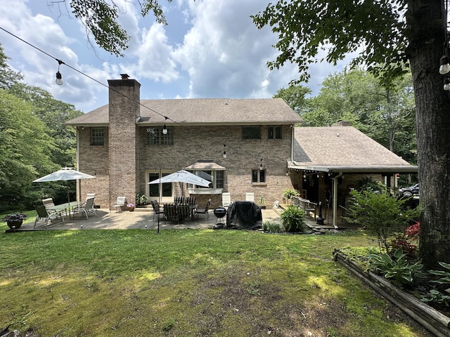 153 Pine Trail Rd, London, KY 40744 - back of house with a patio area, a chimney, a yard, and roof with shingles