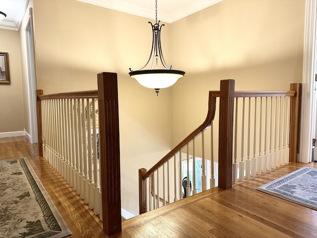 153 Pine Trail Rd, London, KY 40744 - staircase with wood finished floors and crown molding