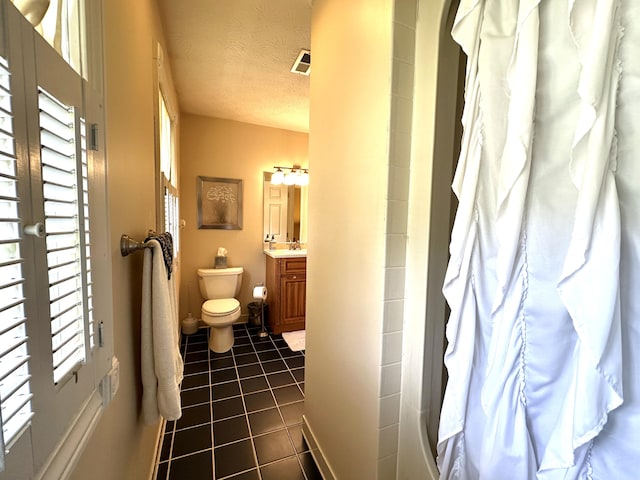 153 Pine Trail Rd, London, KY 40744 - full bath featuring tile patterned floors, vanity, a textured ceiling, and shower / bathtub combination with curtain