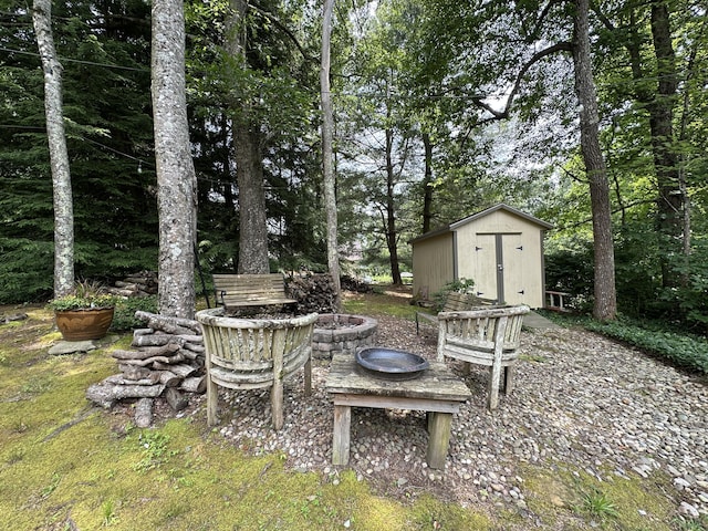 153 Pine Trail Rd, London, KY 40744 - view of yard with a storage shed and a fire pit