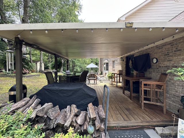 153 Pine Trail Rd, London, KY 40744 - wooden terrace with outdoor dining area and a storage unit