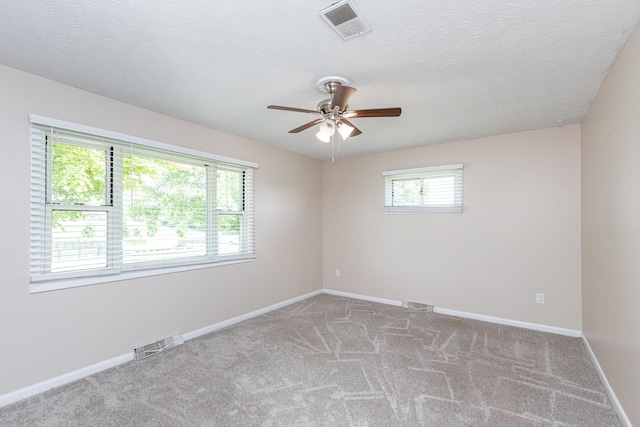 9581 Harrodsburg Rd, Wilmore, KY 40390 - carpeted empty room with ceiling fan and a textured ceiling