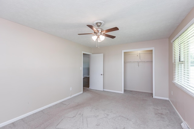 9581 Harrodsburg Rd, Wilmore, KY 40390 - unfurnished bedroom with carpet floors, a closet, and ceiling fan