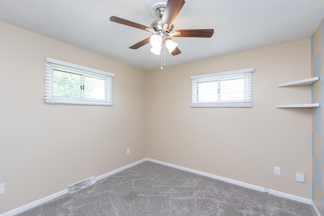 9581 Harrodsburg Rd, Wilmore, KY 40390 - empty room featuring plenty of natural light, ceiling fan, and carpet