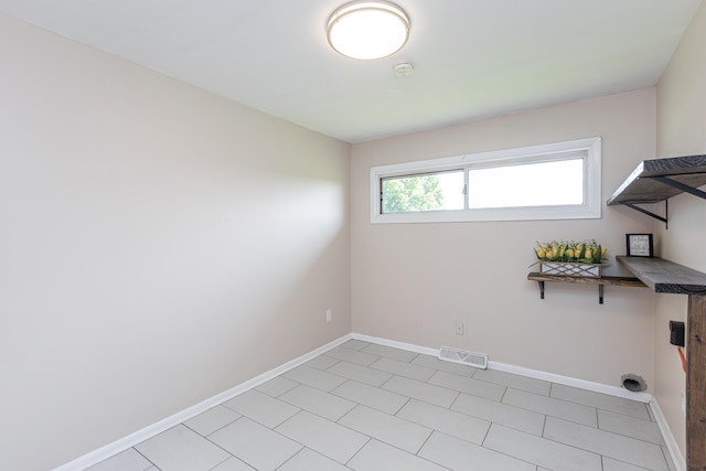 9581 Harrodsburg Rd, Wilmore, KY 40390 - laundry area featuring light tile patterned flooring