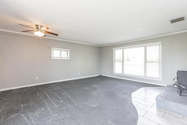 9581 Harrodsburg Rd, Wilmore, KY 40390 - unfurnished living room featuring a ceiling fan, crown molding, and carpet floors