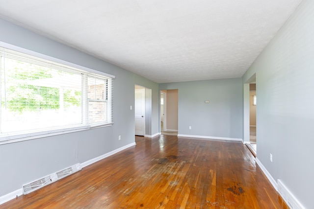 9581 Harrodsburg Rd, Wilmore, KY 40390 - empty room featuring wood-type flooring and baseboards