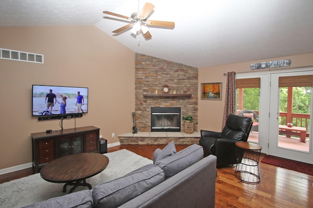5420 Kiddville Ln, Lexington, KY 40515 - living area featuring vaulted ceiling, wood finished floors, a ceiling fan, a fireplace, and baseboards