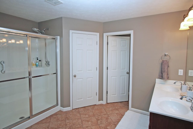 5420 Kiddville Ln, Lexington, KY 40515 - full bath featuring a stall shower, double vanity, and baseboards