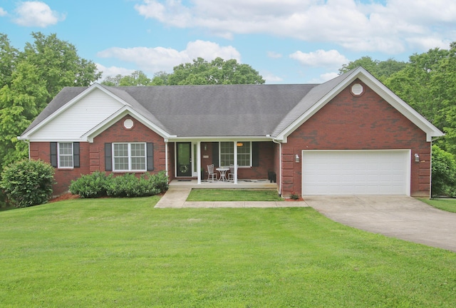 5420 Kiddville Ln, Lexington, KY 40515 - view of front of property featuring brick siding, covered porch, a garage, driveway, and a front yard