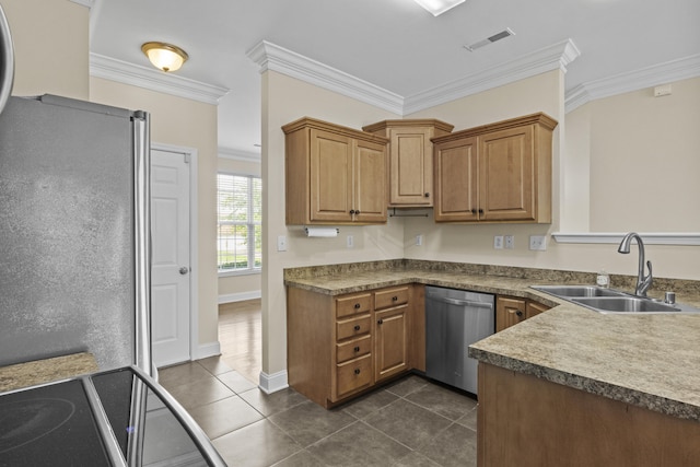 584 Southpoint Dr, Lexington, KY 40515 - kitchen with appliances with stainless steel finishes, dark tile patterned flooring, crown molding, and brown cabinets