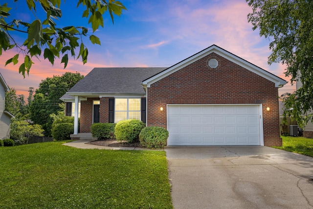 584 Southpoint Dr, Lexington, KY 40515 - traditional-style home featuring brick siding, a front lawn, concrete driveway, an attached garage, and a shingled roof