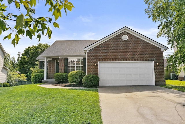 584 Southpoint Dr, Lexington, KY 40515 - traditional-style home with brick siding, a front yard, driveway, a garage, and roof with shingles