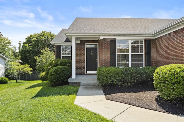 584 Southpoint Dr, Lexington, KY 40515 - view of exterior entry with brick siding and a shingled roof