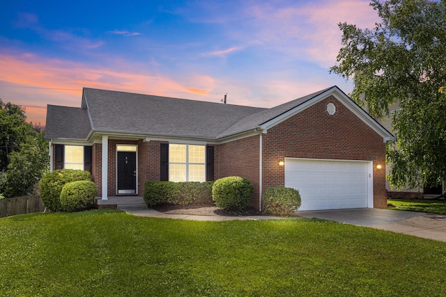 584 Southpoint Dr, Lexington, KY 40515 - view of front of property with a garage, concrete driveway, brick siding, and a shingled roof