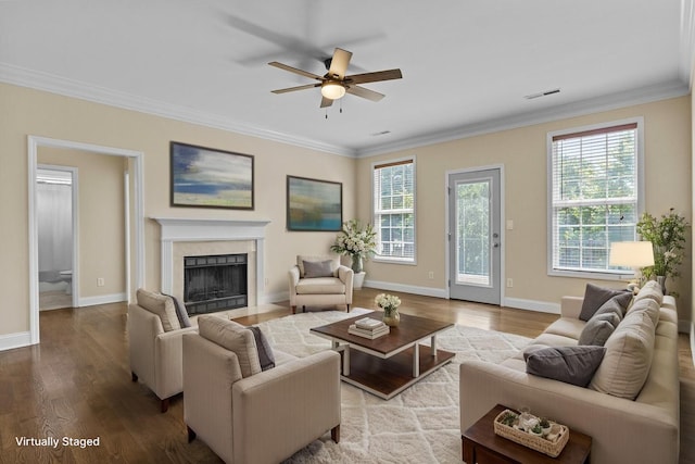 584 Southpoint Dr, Lexington, KY 40515 - living room featuring ornamental molding, a premium fireplace, a ceiling fan, and wood finished floors