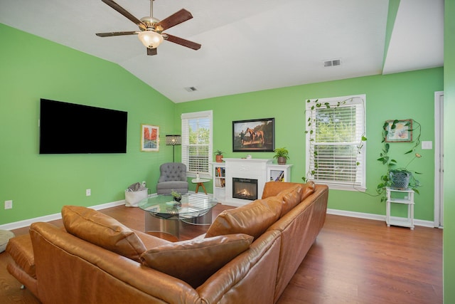 1280 Kennecott Way, Lexington, KY 40514 - living room featuring lofted ceiling, a ceiling fan, a glass covered fireplace, and wood finished floors